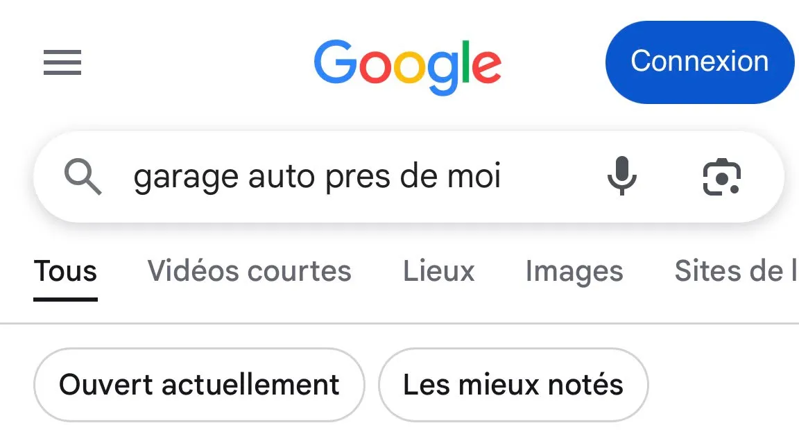 Recherche Google sur téléphone : « garage auto près de moi », avec les filtres Ouvert actuellement et Les mieux notés